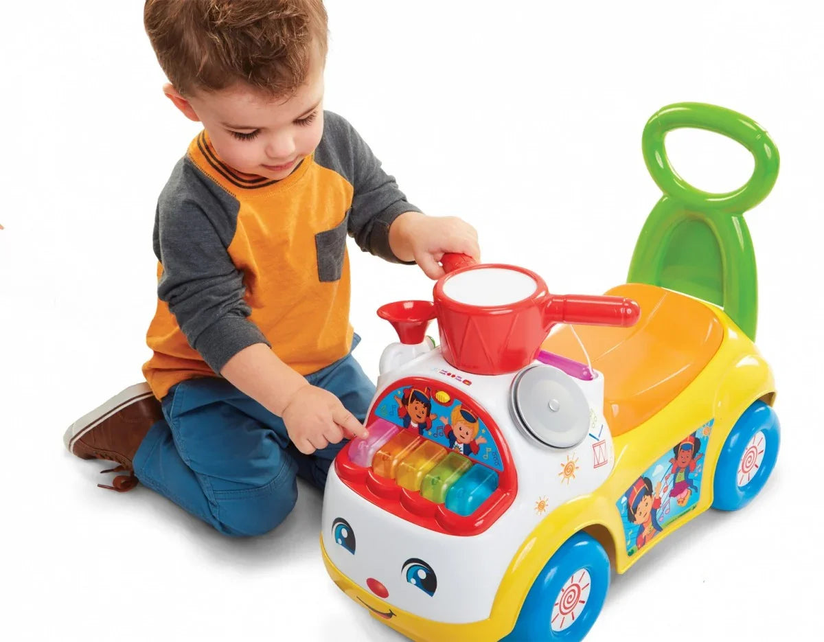 Jeździk Fisher Price Muzyczna Parada żółty - zabawki-dla-dziewczynki