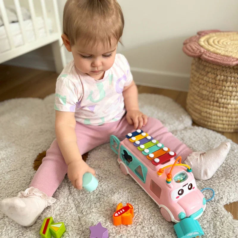 WOOPIE BABY Samochodzik Muzyczny Sorter z Cymbałkami Różowy - zabawki-dla-dziewczynki