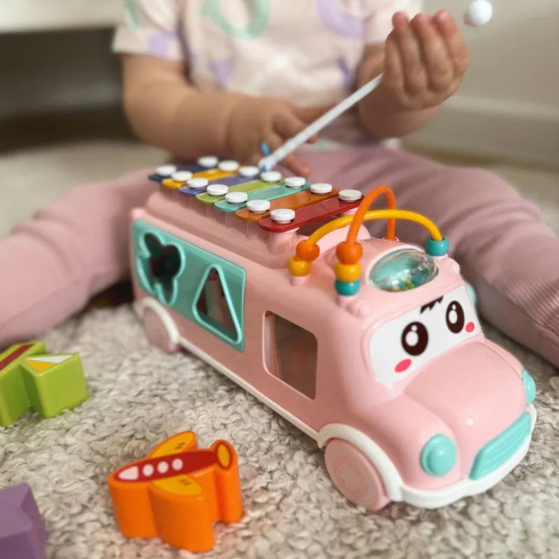 WOOPIE BABY Samochodzik Muzyczny Sorter z Cymbałkami Różowy - zabawki-dla-dziewczynki