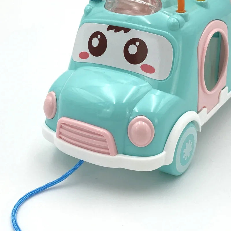 WOOPIE BABY Samochodzik Muzyczny Sorter z Cymbałkami Różowy - zabawki-dla-dziewczynki