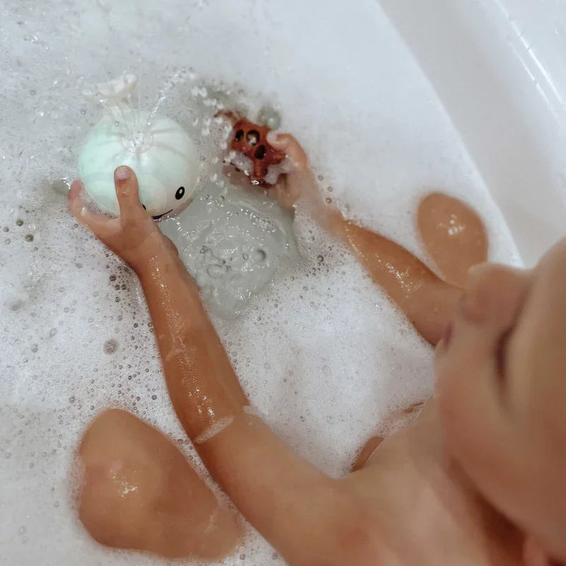 WOOPIE BABY Zabawka do Kąpieli Wieloryb Tryskający Wodą Fontanna LED - zabawki-dla-dziewczynki