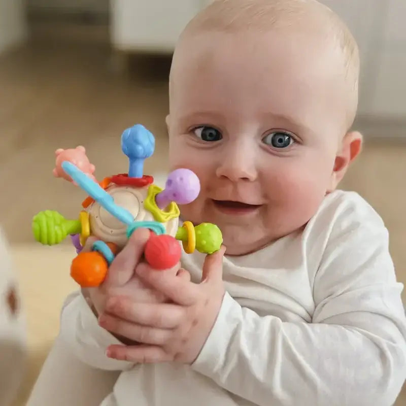 Miękka grzechotka WOOPIE BABY dla niemowląt 0m+ - zabawki-dla-dziewczynki