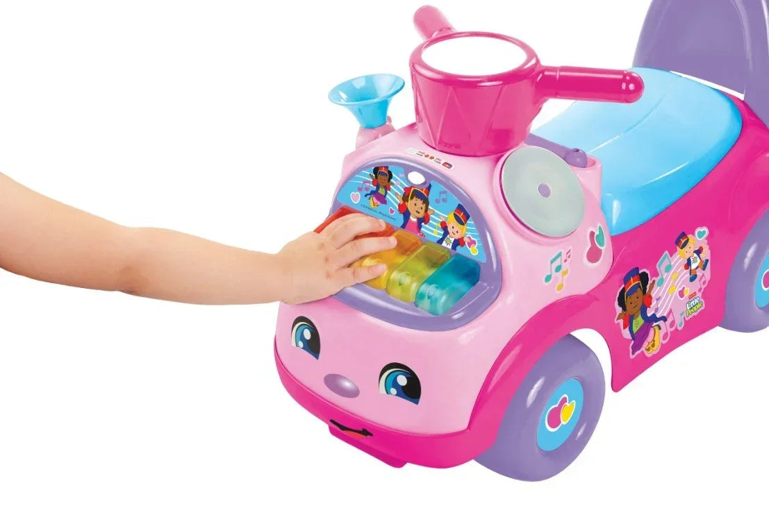 Fisher Price jeździk różowy Muzyczna Parada interaktywny - zabawki-dla-dziewczynki
