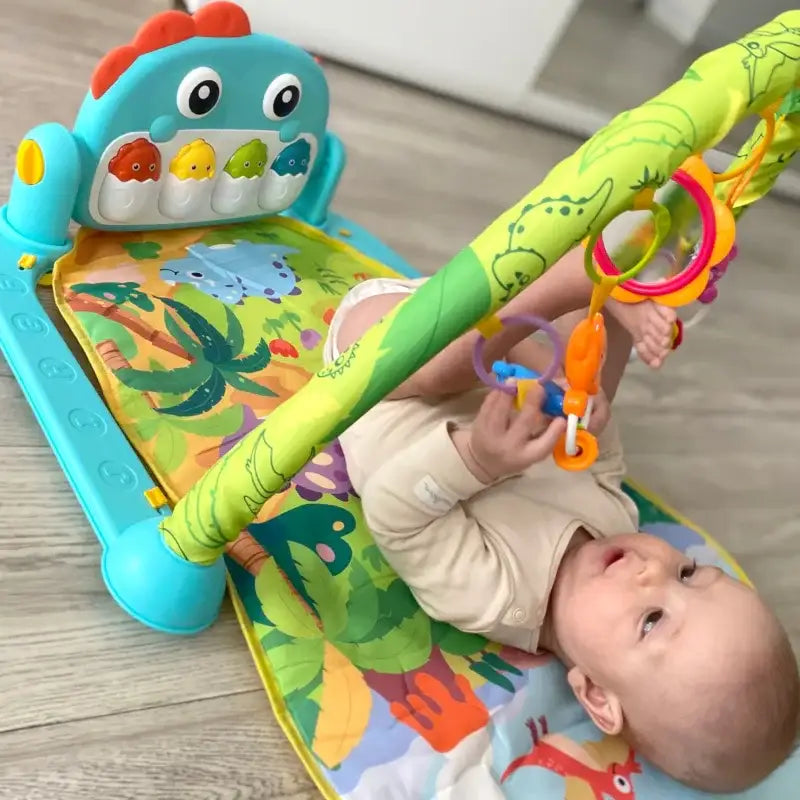 WOOPIE BABY mata do zabawy z pałąkiem i zawieszkami Dino - zabawki-dla-dziewczynki