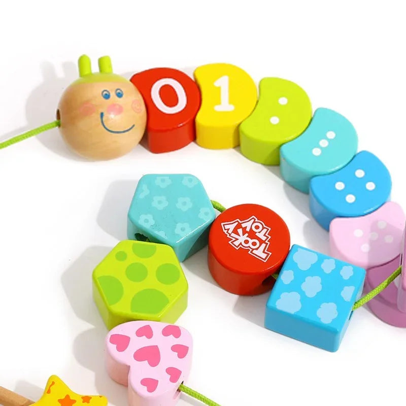 TOOKY TOY drewniane klocki do nawlekania gąsienica - zabawki-dla-dziewczynki