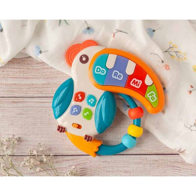 WOOPIE BABY Zabawka Muzyczna Pianinko Gryzaczek Pelikan 3w1 - zabawki-dla-dziewczynki